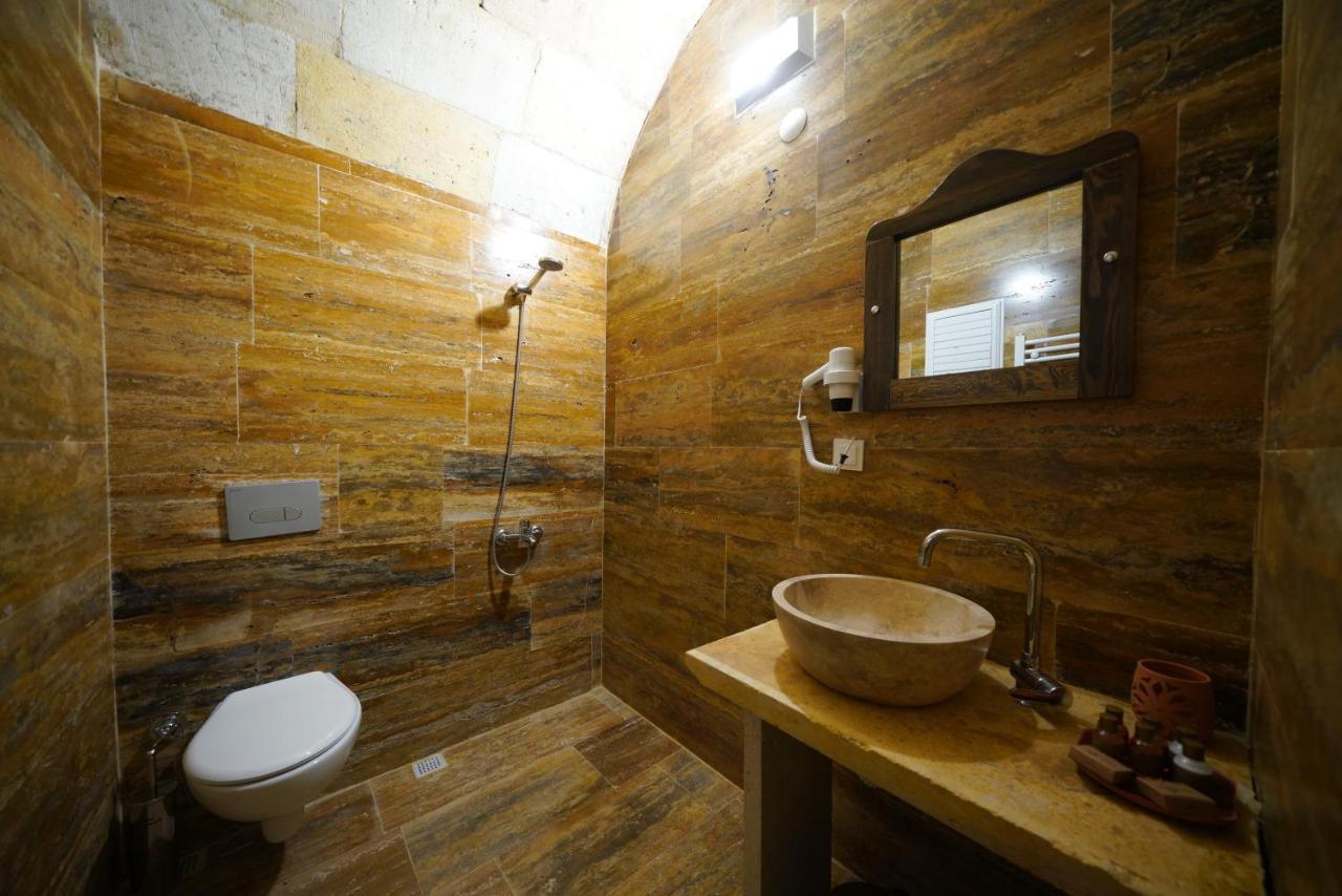 Tibet Stone House Hotel เนฟซิเฮียร์ ภายนอก รูปภาพ