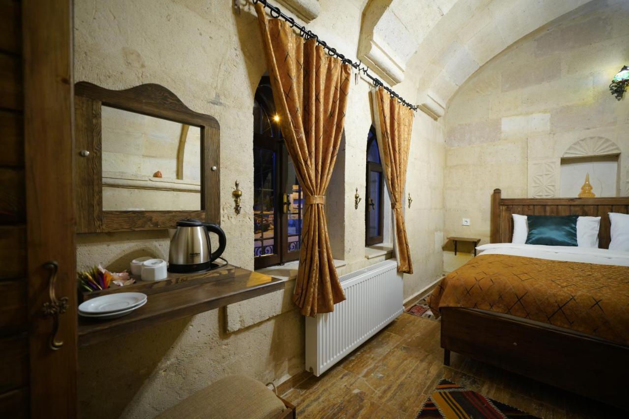 Tibet Stone House Hotel เนฟซิเฮียร์ ภายนอก รูปภาพ