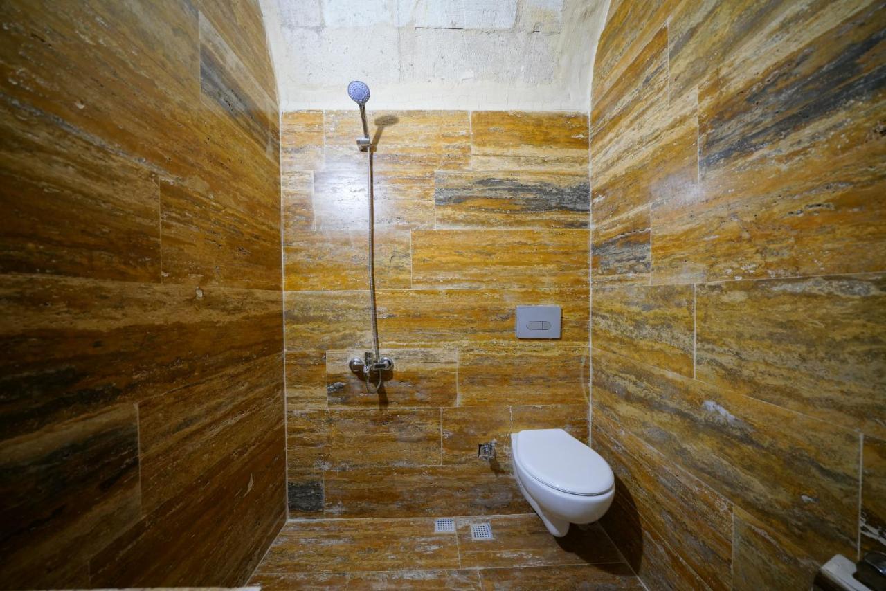 Tibet Stone House Hotel เนฟซิเฮียร์ ภายนอก รูปภาพ