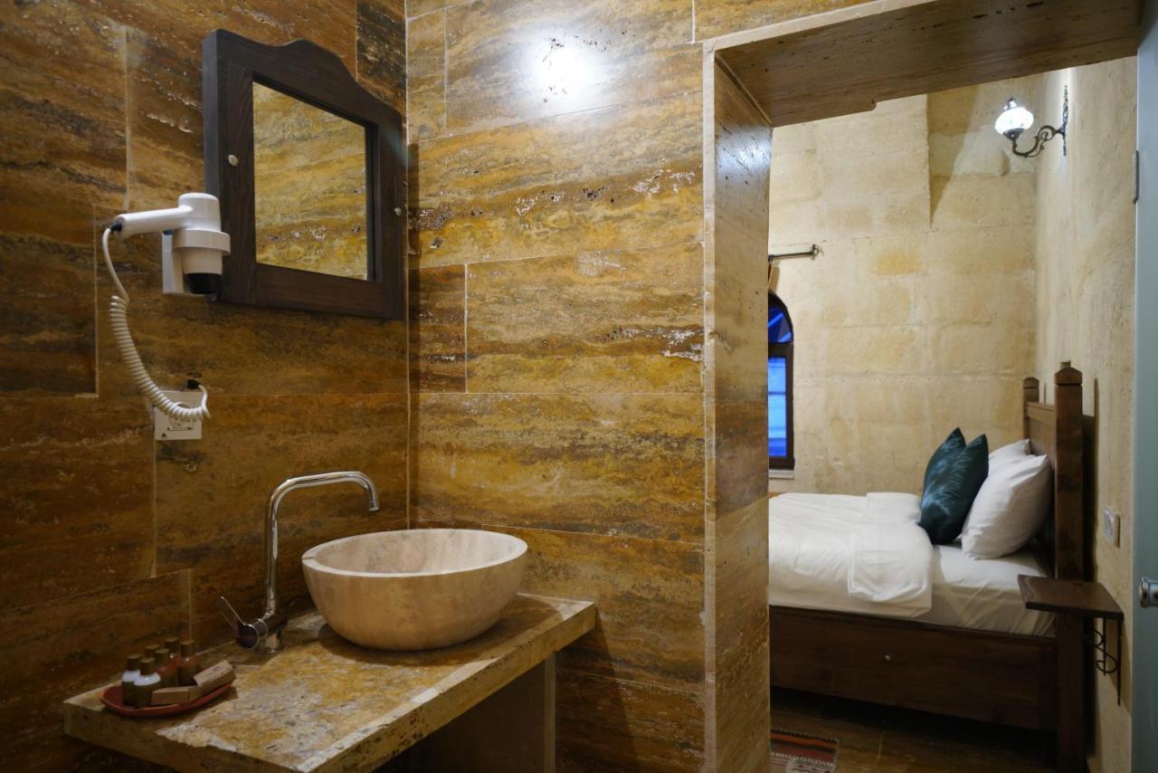 Tibet Stone House Hotel เนฟซิเฮียร์ ภายนอก รูปภาพ