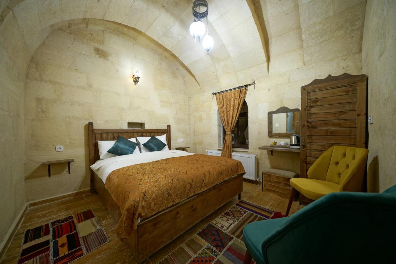 Tibet Stone House Hotel เนฟซิเฮียร์ ภายนอก รูปภาพ